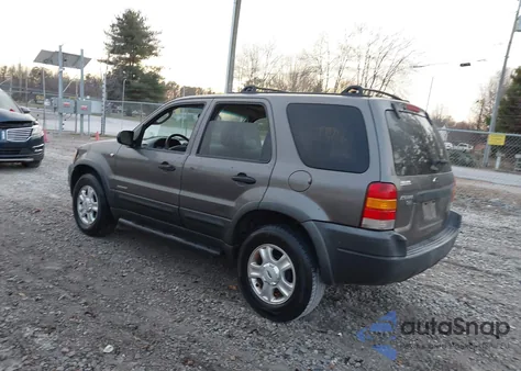 2002 Ford Escape Xlt z USA, uszkodzony, nr VIN 1FMYU03102KD68564